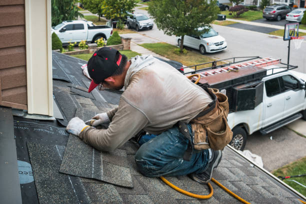 Professional Roofing technician working in Watkins, CO